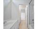 Bathroom with shower and tub combo with white vanity at 11537 Claymont Cir, Windermere, FL 34786