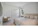Bright bedroom featuring a queen size bed, white closet and light color palette at 11537 Claymont Cir, Windermere, FL 34786
