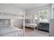Bright bedroom with bunk beds and modern colors at 11537 Claymont Cir, Windermere, FL 34786