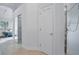 Hallway outside of the main bedroom leading to the ensuite bathroom and closet at 11537 Claymont Cir, Windermere, FL 34786