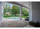 Back patio with a swimming pool, and an outdoor seating area at 11537 Claymont Cir, Windermere, FL 34786