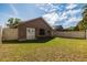 Expansive backyard featuring a well-maintained lawn at 1209 Creekbottom Cir, Orlando, FL 32825