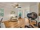 Spacious living room with hardwood floors and plenty of natural light at 13067 Woodford St, Orlando, FL 32832