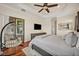 Spacious main bedroom features hardwood floors and a comfortable sitting area at 13067 Woodford St, Orlando, FL 32832