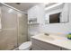 Bathroom with a glass-enclosed shower and an updated vanity at 144 E Plantation Blvd, Lake Mary, FL 32746