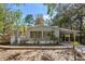 Charming single-story home with a covered carport and lush landscaping at 144 E Plantation Blvd, Lake Mary, FL 32746
