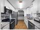 Bright kitchen features stainless steel appliances, granite countertops and stylish backsplash at 144 E Plantation Blvd, Lake Mary, FL 32746