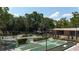 Overhead view of shuffleboard courts with mini golf, surrounded by green spaces and well-maintained landscaping at 144 E Plantation Blvd, Lake Mary, FL 32746