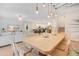 Open-concept living room with combined living and dining area offering a seamless flow and modern design at 1445 Rolling Fairway Dr, Davenport, FL 33896