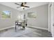 Functional home office space with natural light and a modern desk setup at 1612 Eastbrook Blvd, Winter Park, FL 32792