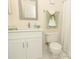 This renovated bathroom has a white vanity, modern hardware, and a shower at 164 Reserve Cir # 208, Oviedo, FL 32765