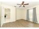 Bedroom featuring neutral walls and a window with natural light at 164 Reserve Cir # 208, Oviedo, FL 32765
