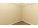 This bedroom closet is equipped with wire shelving at 164 Reserve Cir # 208, Oviedo, FL 32765
