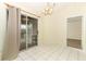 Dining room includes sliding glass door access to screened porch at 164 Reserve Cir # 208, Oviedo, FL 32765