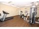 Community gym with treadmill, elliptical machine, and weightlifting equipment at 164 Reserve Cir # 208, Oviedo, FL 32765