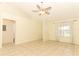 Spacious living room featuring tile floors, ample natural light, and an open layout at 164 Reserve Cir # 208, Oviedo, FL 32765