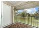 Screened in patio overlooks grass area at 164 Reserve Cir # 208, Oviedo, FL 32765
