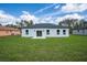 Spacious backyard with lush green grass, and plenty of sunlight at 17046 Sw 44Th Cir, Ocala, FL 34473