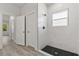 Shower in luxury bathroom with white tile at 17046 Sw 44Th Cir, Ocala, FL 34473