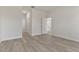 Bright bedroom with light wood floors and neutral paint, offering a versatile space for rest and relaxation at 17046 Sw 44Th Cir, Ocala, FL 34473