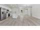 Modern kitchen with white cabinetry, stainless steel appliances, and a kitchen island at 17046 Sw 44Th Cir, Ocala, FL 34473