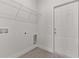 This laundry room features wire shelving and a utility door at 17046 Sw 44Th Cir, Ocala, FL 34473
