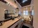 Classic bathroom with vanity, ornate light fixtures, and shower with curtain at 202 S Hampton Ave, Orlando, FL 32803