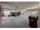 Spacious carport providing covered parking and featuring ample room for vehicle and storage at 202 S Hampton Ave, Orlando, FL 32803