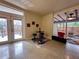 Bright dining area features unique artwork and an adjacent outdoor patio, perfect for entertaining at 202 S Hampton Ave, Orlando, FL 32803