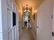 Inviting foyer with a decorative chandelier and views into the spacious living area at 202 S Hampton Ave, Orlando, FL 32803
