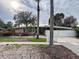 A single story home with a manicured lawn and desert landscaping at 202 S Hampton Ave, Orlando, FL 32803