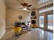 Inviting living room features a fireplace and access to the backyard patio at 202 S Hampton Ave, Orlando, FL 32803