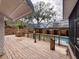 Spacious backyard pool with a covered deck and mature landscaping creating a private outdoor oasis at 202 S Hampton Ave, Orlando, FL 32803