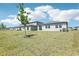 Wide-open backyard space, perfect for and pets at 2094 Rosewood Dr, Bartow, FL 33830
