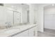 Modern bathroom with double sinks, granite counters, and a glass shower at 2094 Rosewood Dr, Bartow, FL 33830