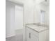 A stylish bathroom vanity with granite countertops and chrome fixtures at 2094 Rosewood Dr, Bartow, FL 33830