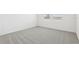 Bright bedroom with plush carpeting and double windows offering natural light at 2094 Rosewood Dr, Bartow, FL 33830