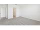 Neutral bedroom with soft carpeting, ensuite bathroom access, and ample space at 2094 Rosewood Dr, Bartow, FL 33830