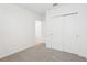 Bright bedroom with a closet and neutral carpet at 2094 Rosewood Dr, Bartow, FL 33830