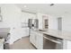 Beautiful kitchen with stainless steel appliances, granite countertops, and an island with a sink and dishwasher at 2094 Rosewood Dr, Bartow, FL 33830