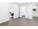 Open bedroom hallway with a bathroom and living area at 2411 Crawford Dr, Sanford, FL 32771