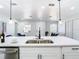Open kitchen view highlighting the island with a sink and faucet, perfect for entertaining guests at 2411 Crawford Dr, Sanford, FL 32771