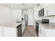Modern kitchen with stainless steel appliances, granite countertops, and ample cabinet space, perfect for culinary enthusiasts at 2511 Linda Knoll Ln, Bartow, FL 33830