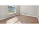 Bedroom featuring neutral paint, standard window, and base trim at 2524 Monaco Cove Cir, Orlando, FL 32825