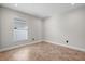 Clean bedroom with tile flooring, natural light, and standard size window at 2524 Monaco Cove Cir, Orlando, FL 32825