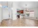 Bright living room featuring tiled floors, an open-concept design, and high ceilings at 2524 Monaco Cove Cir, Orlando, FL 32825