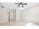 Tile floored bedroom, ceiling fan, closet and bath access at 3004 Parkway Blvd # 203, Kissimmee, FL 34747