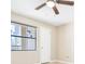 Bedroom with window and tile flooring at 3004 Parkway Blvd # 203, Kissimmee, FL 34747