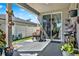 This patio offers direct access to both the backyard and the interior of the home at 3086 Brenton Manor Loop, Winter Haven, FL 33881
