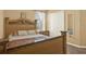 Well-lit bedroom featuring a built-in closet, a window, and neutral paint at 3086 Brenton Manor Loop, Winter Haven, FL 33881